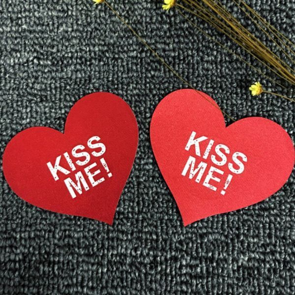 Наклейки на груди у вигляді сердечок KissMe атласні для сексуального образу червоні 2 штуки WAC-1304 фото